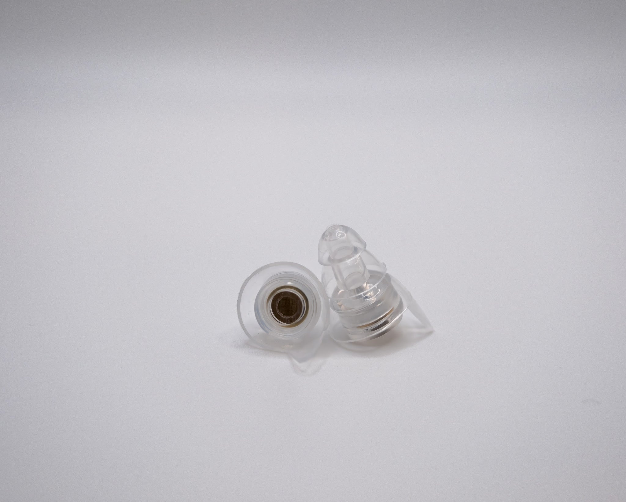 A set of Ear-Goes X27 earplugs on a white background.